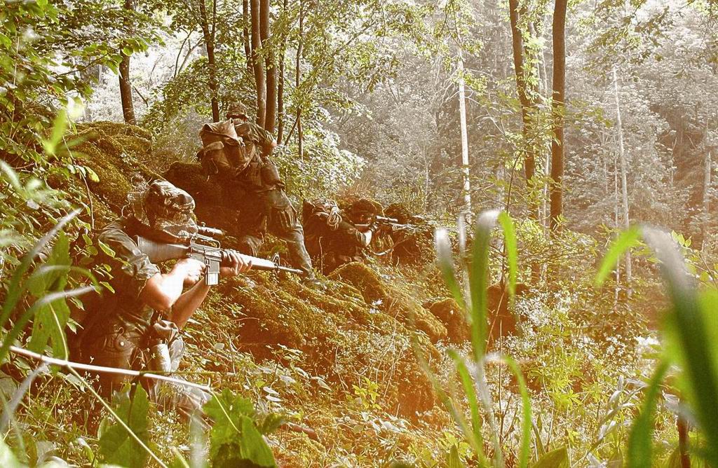 1969checking the trail down in the valley (L-R Sgt. Campbell, PFC. MacCormack, SGT. Rossi).jpg