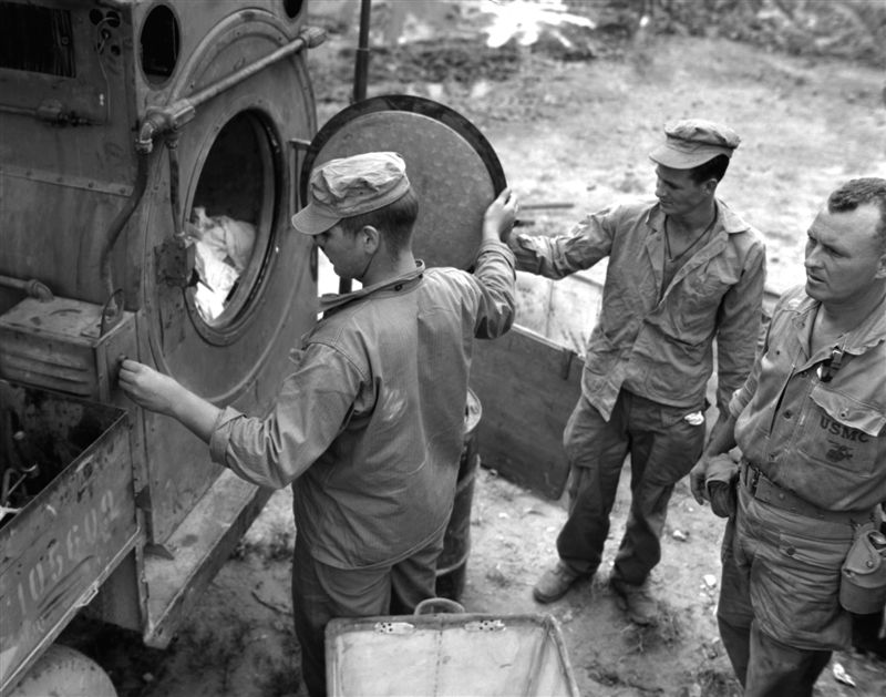 Mobile laundry units in the field help Marines remove the dirt and grime ofthe battlefield, somewhere in Korea..jpg