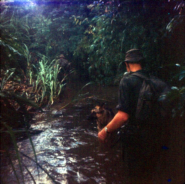 CPL Michael Jibs Burns and scout dog.jpg